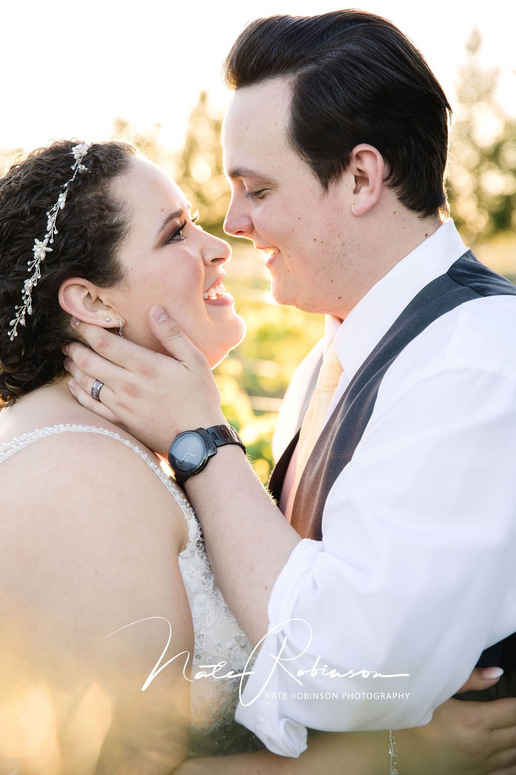 groom holding his bride's face and looking at her at their Beacon Hill Wedding