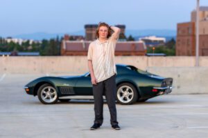 Spokane Driver's Ed complete, this senior takes photos of his car in front of Cheney High School