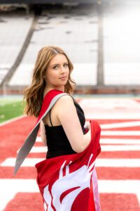 Girl with draped WSU flag