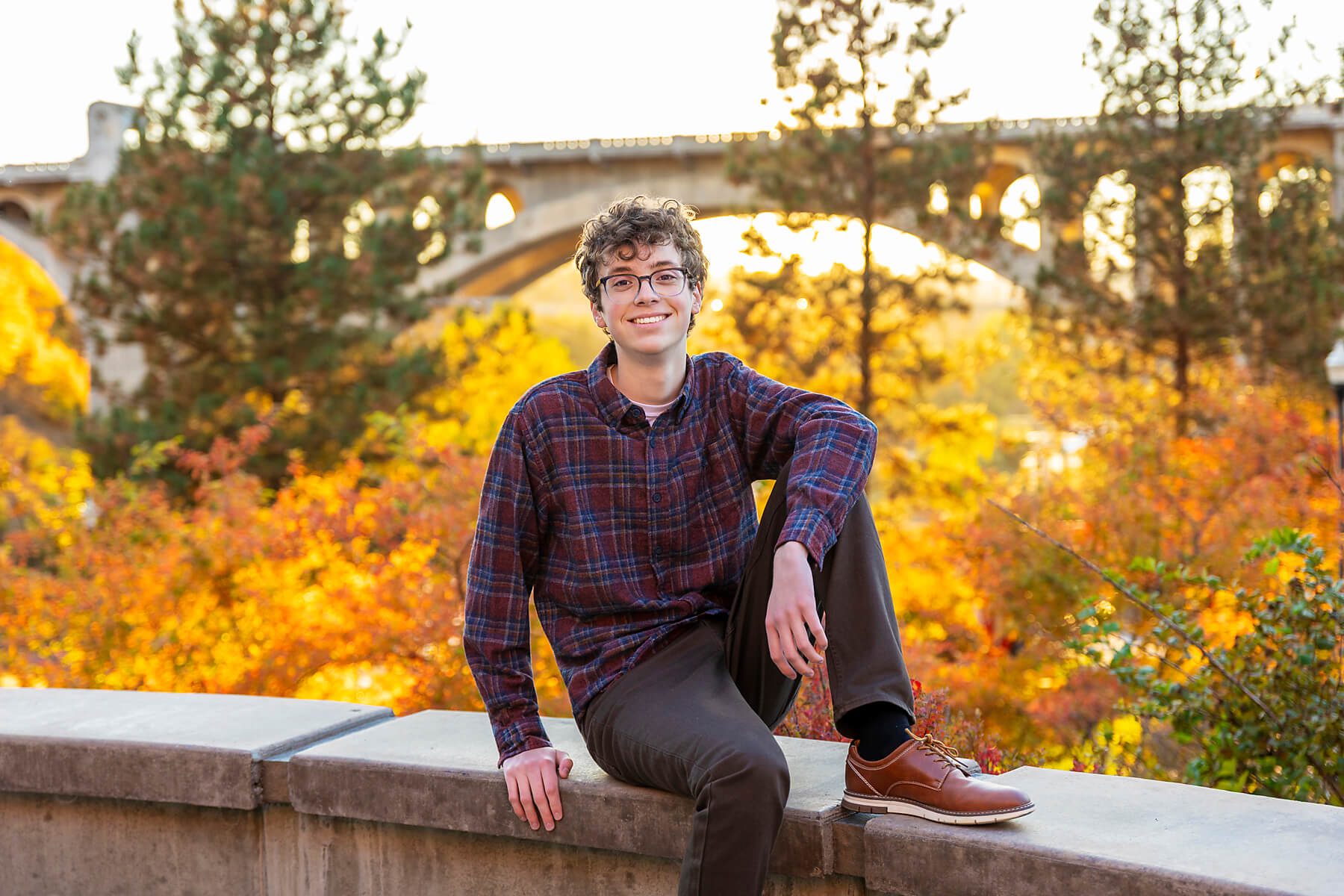 One of the best Spokane Senior Portrait Locations for a senior guy in a fall setting.